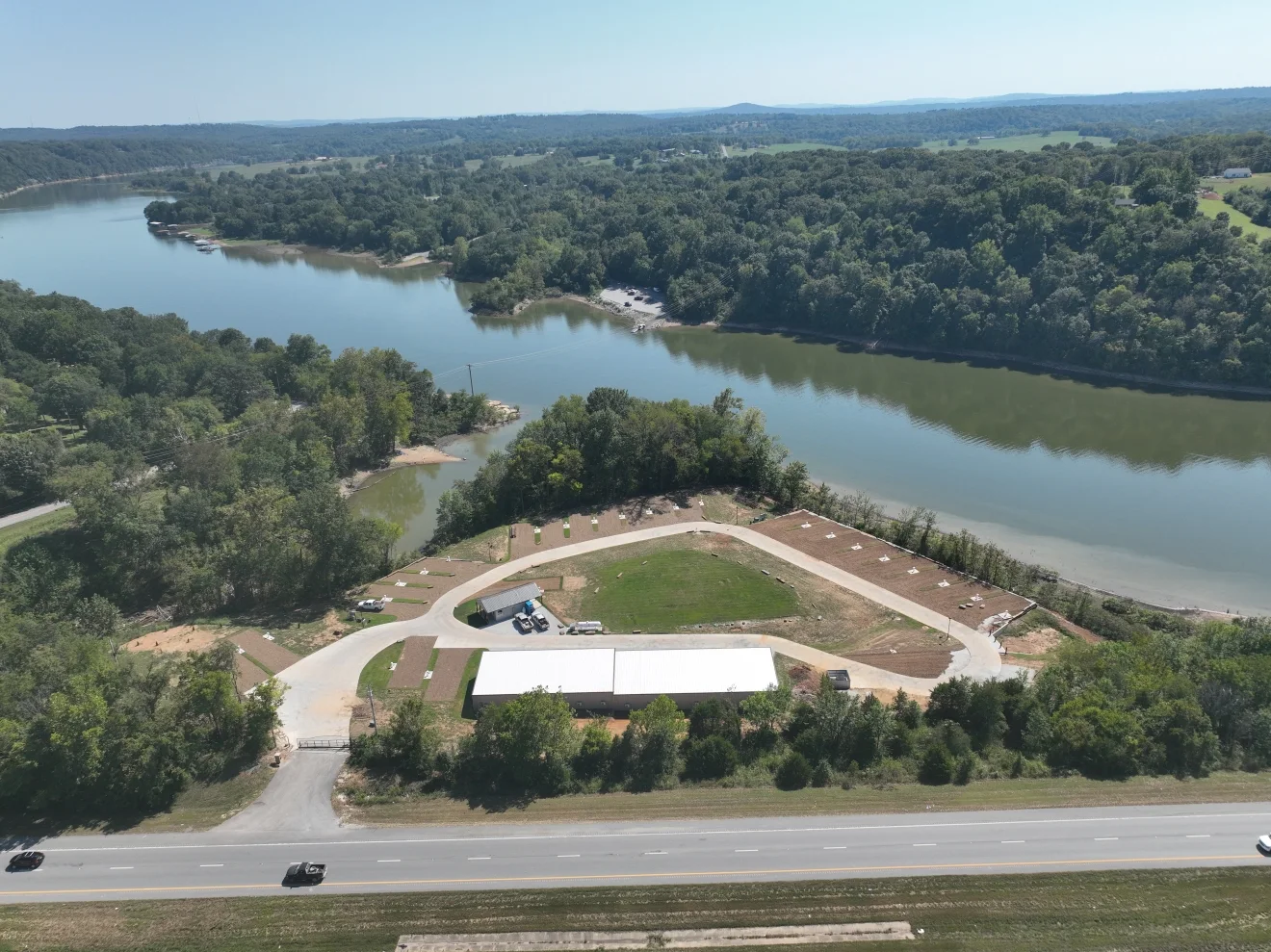 Aerial view of the Belle Pointe peninsula on Beaver Lake with Highway 412 in the foreground